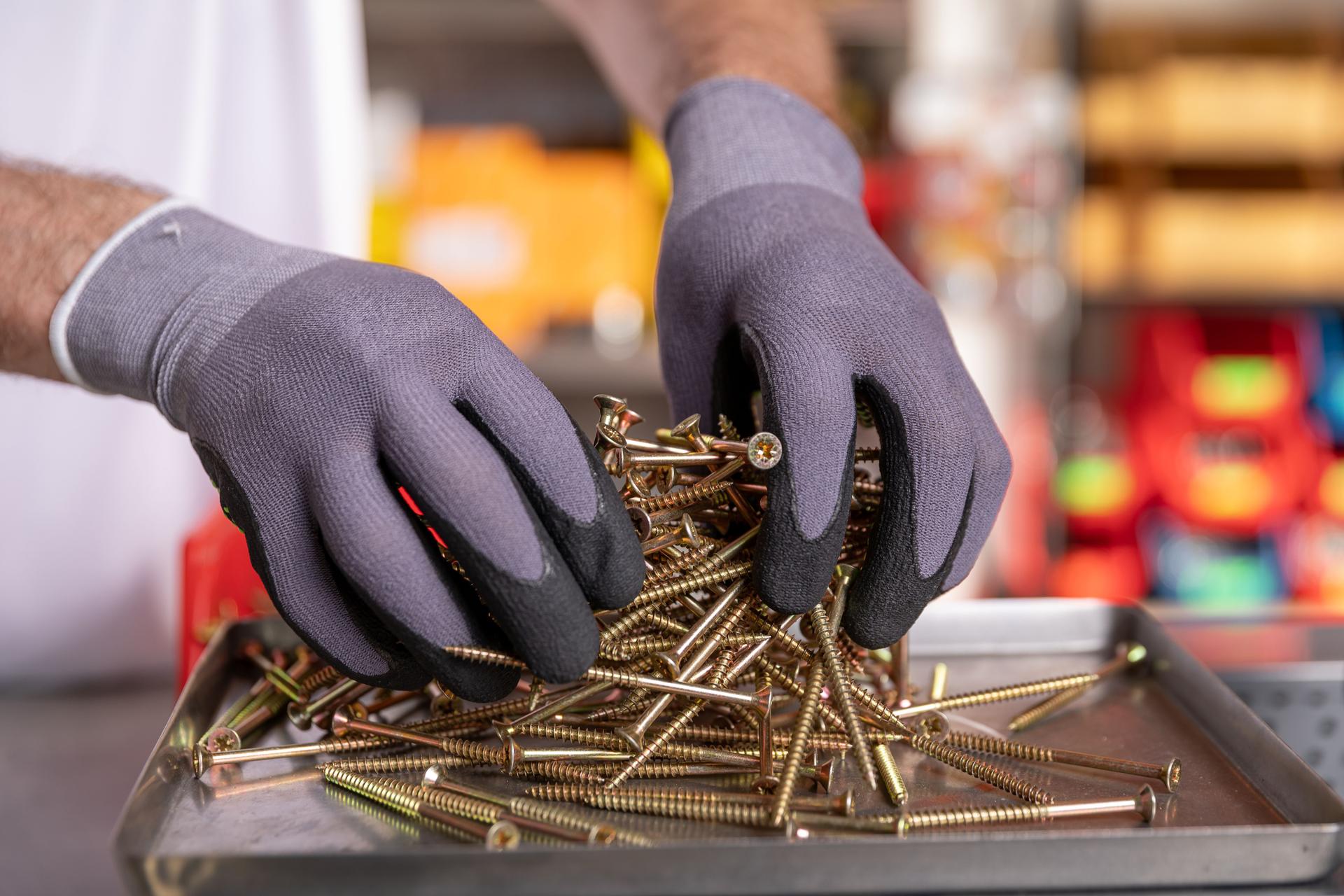 Sorting Metal Components with Precision and Care in a WellOrganized Workshop Environment